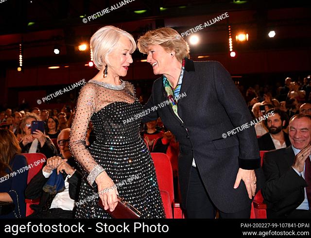 27 February 2020, Berlin: 70th Berlinale, awarding of the Golden Bear of Honour to Mirren. Actress Helen Mirren (l) and Monika Grütters (CDU)
