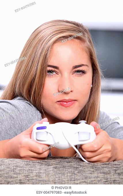 Young woman with video game controller