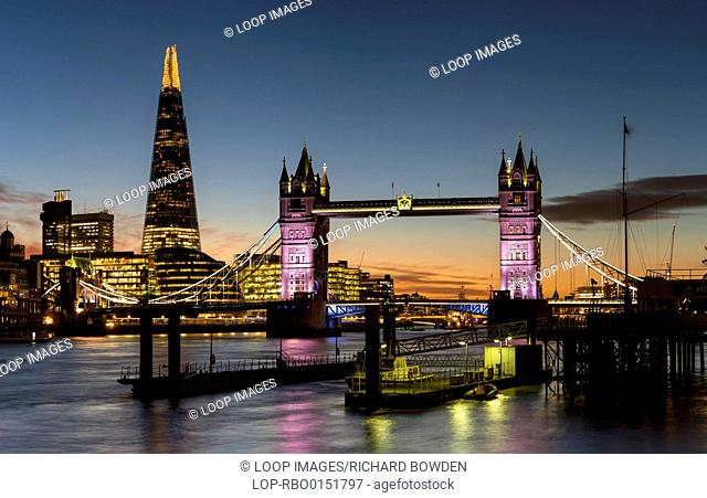 A view of the Thames at night including Tower Bridge and The Shard