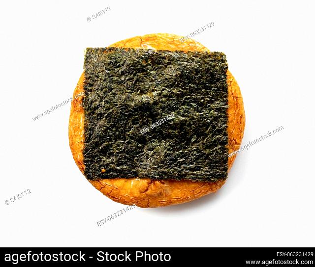 Nori crackers placed on a white background. Viewed from above