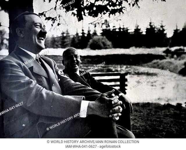 Adolf Hitler 1889-1945. relaxing at a country retreat. German politician and the leader of the Nazi Party driving a car. He was chancellor of Germany from 1933...