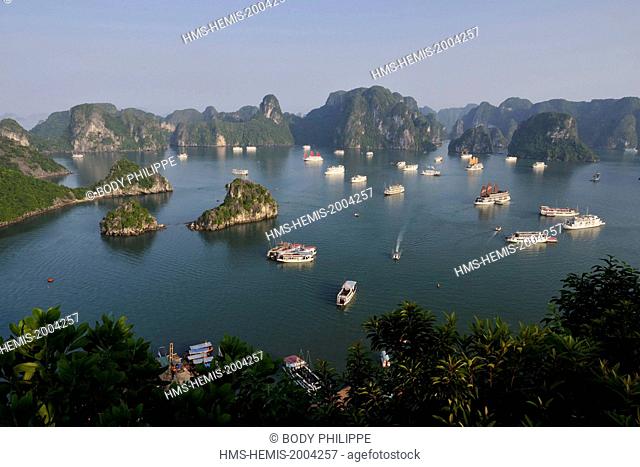 Vietnam, Quang Ninh province, Ha Long bay, listed as World Heritage by UNESCO, junk boat in the bay