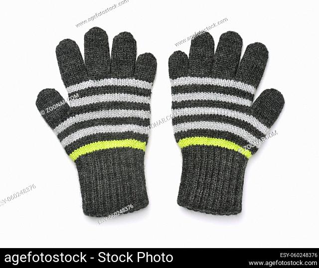 Top view of two warm woolen knitted gloves isolated on white