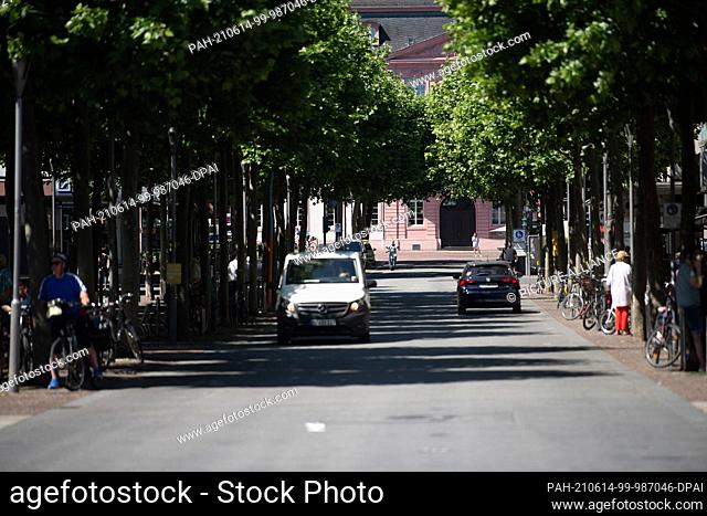 14 June 2021, Rhineland-Palatinate, Mainz: Cars drive through the city centre. The city of Mainz has presented an ""access protection concept"" for events in...