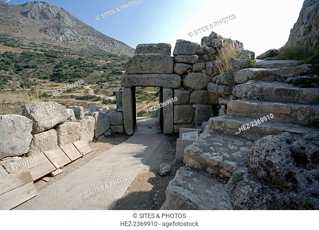 The North Gate (Postern) at Mycenae, Greece. Mycenae is an archaeological site in Greece, located about 90 km southwest of Athens