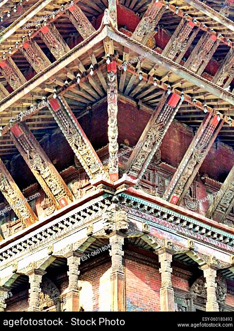 Ornate carvings on corner of historic building, Bhaktapur, Nepal. High quality photo