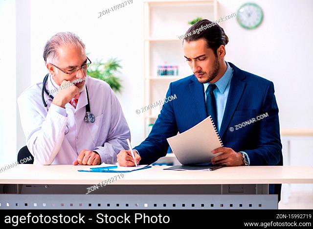 Doctor and businessman discussing medical project