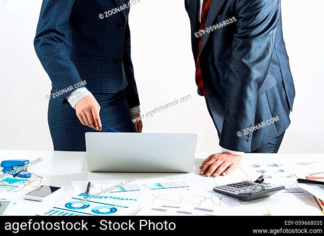 Business partnership concept with business people. Office desk with financial analytics. Business meeting in conference hall