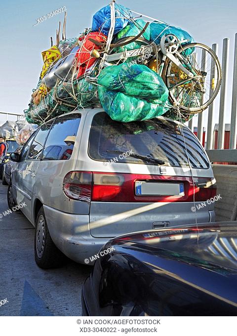 overloaded cars waiting for ferry to Morocco, Maritime Station, Barcelona, Spain