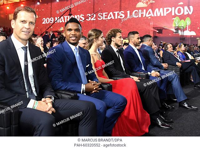 Manager of the German national team Oliver Bierhoff (L) and soccer player Samuel Eto'o sit ahead of the Preliminary Draw for the FIFA World Cup 2018, in St