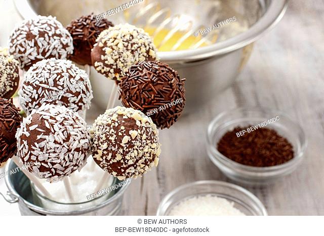 Chocolate cake pops in silver bucket. Party dessert