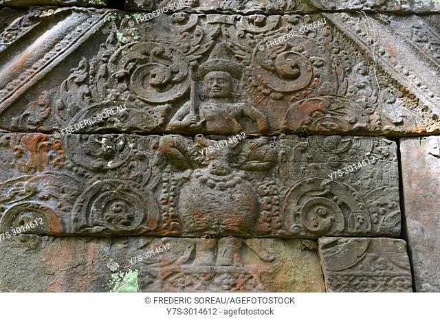Stone carvings on the lintel above a doorway at Prasat Kra Chap temple part of Koh Ker 127 NE of Siem Reap, Cambodia, South East Asia, Asia