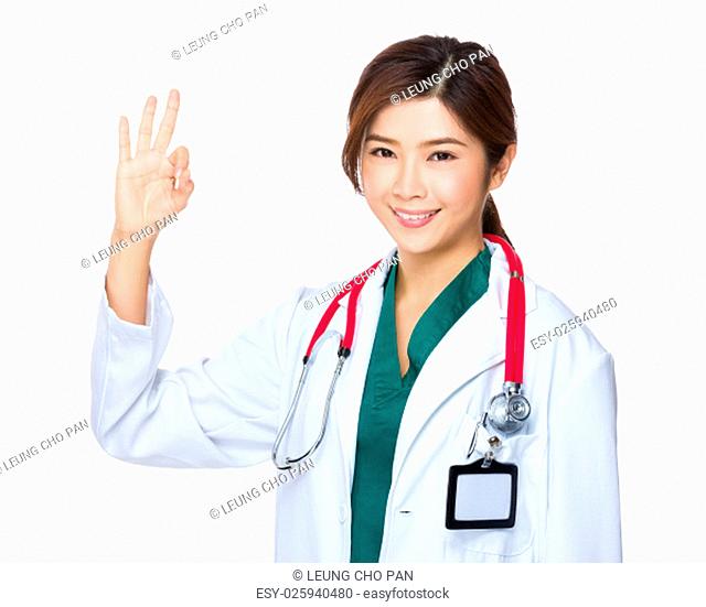 Asian Young Doctor with ok sign gesture