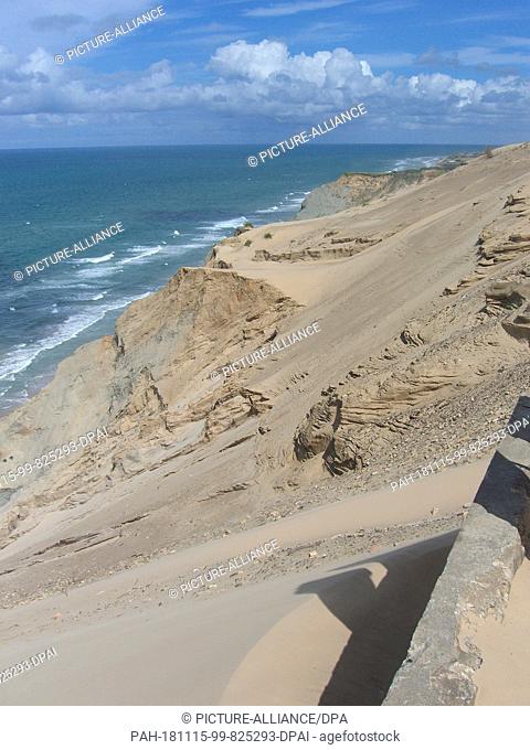 28 July 2014, Denmark, Lönstrup: Sand formations of the moving dune Rubjerg Knude at the lighthouse on the west coast of Denmark near Lönstrup