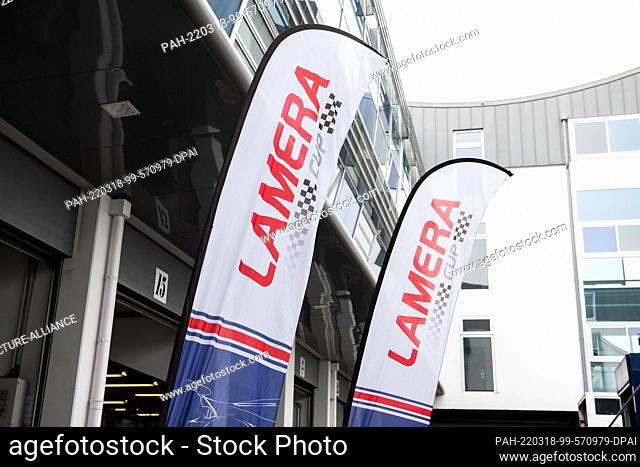 16 March 2022, France, Magny-Cours: The Lamera Cup lettering can be seen on banners in the pit lane of the Magny-Cours race track
