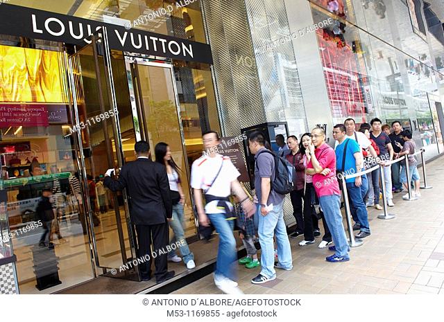 customers queue outside a louis vitton store in kowloon district  hong kong  china  picture taken may 2010