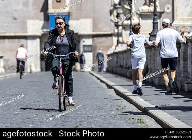 A cyclist on Saint Angelo bridge during the last day of total lockdown before the phase 2 Rome, ITALY-03-05-2020