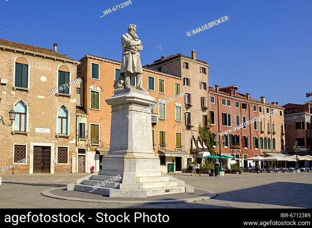Monument to Niccolò Tommaseo, 1802-1884, Italian writer and lexigrapher, statue by Francesco Barzaghi, Campo Santo Stefano, Venice, Veneto, Italy, Europe