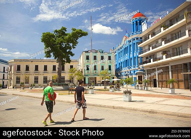 People in front of the Santa Cecilia Convention Center-Centro de Convenciones at the historic center, Camagüey, Cuba, West Indies, Central America