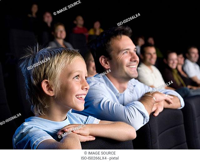 Father and son watching a movie