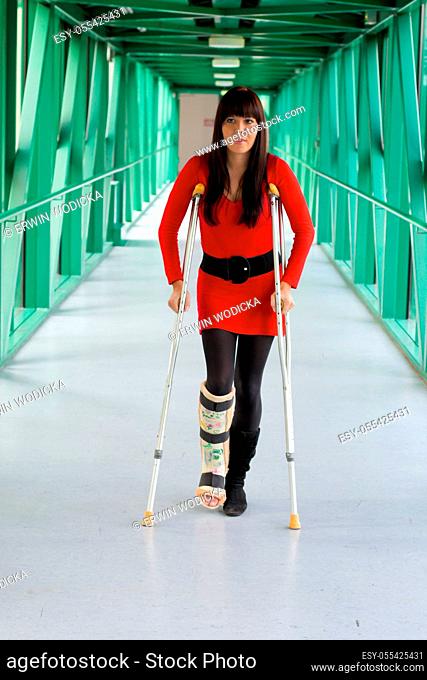 young woman, crutch, leg cast