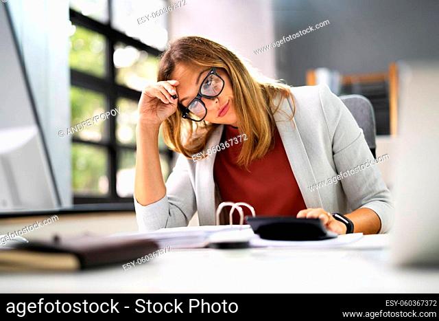 Stressed Accountant Woman With Headache In Office
