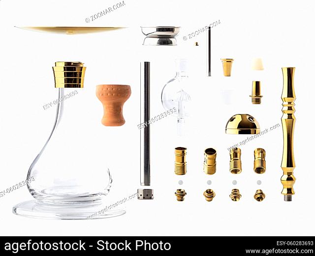 Separated and isolated stainless steel and glass components of a modern gold hookah on white background