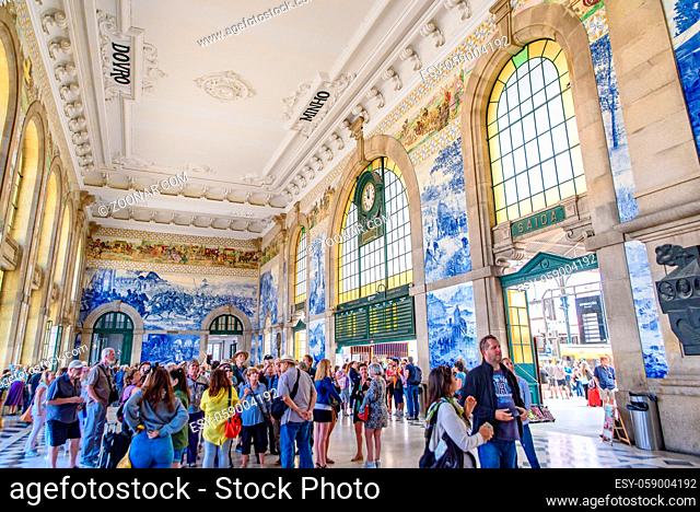 Interior of São Bento Railway Station, decorated with Azulejo panel, in Porto, Portugal