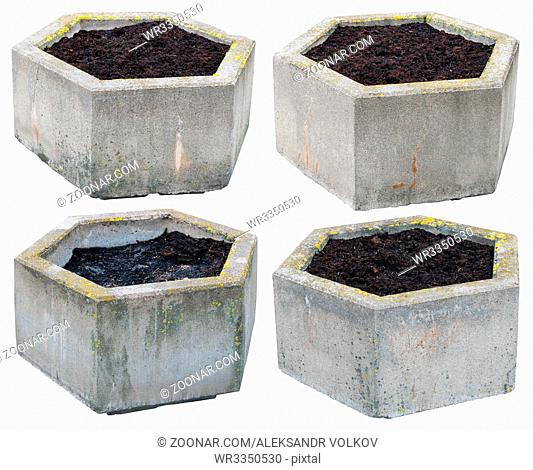 Big hexagonal vintage concrete flowerpots are filled with soil compost and are ready to landing of spring flowers. Isolated set