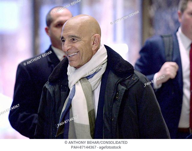 Chairman of the Inaugural Committee and real estate investor Thomas J. Barrack Jr. walks towards members of the media in the lobby of the Trump Tower in New...