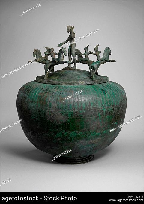 Bronze cinerary urn with lid. Period: Archaic; Date: ca. 500 B.C; Culture: Etruscan, Campanian; Medium: Bronze; Dimensions: H. 19 1/16 in. (48