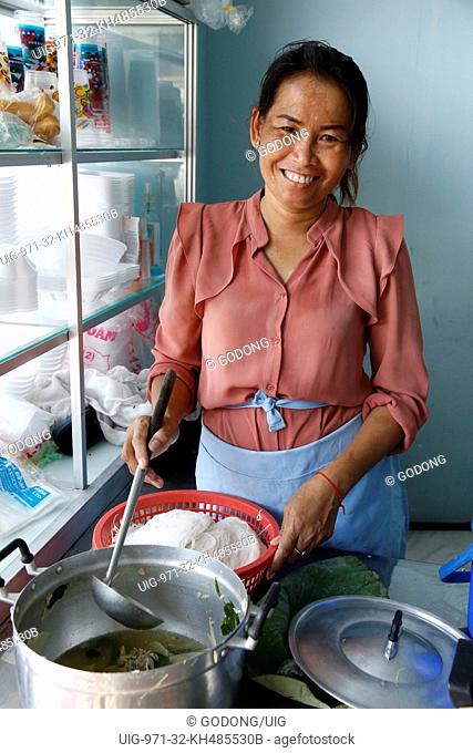 Somaly Long runs a small restaurant financed by a 3 million riel from Chamroeun microfinance