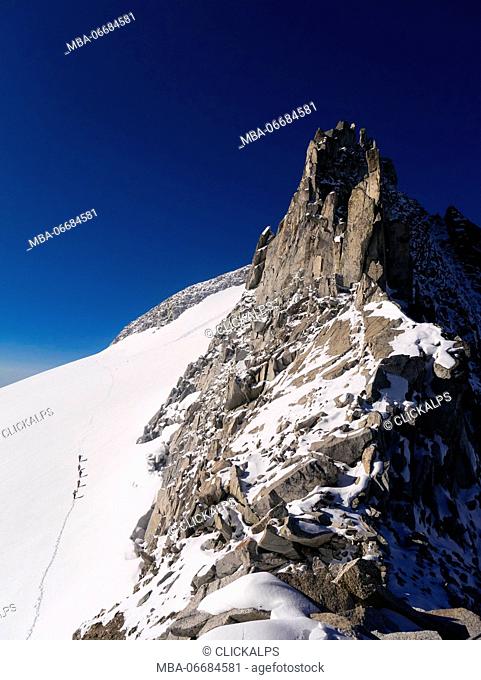 Climbers at Corno di Cavento, Adamello-Presanella park, Italy, Alps