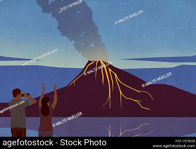 Excited tourists watching volcano eruption