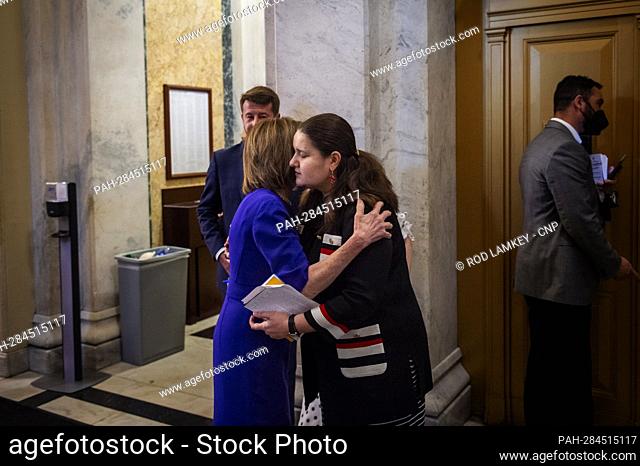 Ambassador of Ukraine to the United States Oksana Markarova, right, is embraced by Speaker of the United States House of Representatives Nancy Pelosi (Democrat...