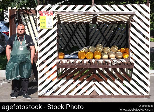 RUSSIA, MOSCOW - AUGUST 5, 2023: A street vendor sells melons and watermelons in Tishinskaya Square. Sergei Fadeichev/TASS