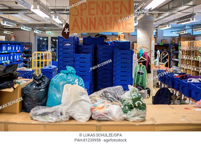'Donation drop-off' can be read at the Hanseatic Help e.V. aid organization in Hamburg, Germany, 15 June 2016. On 16 June 2016 the aid organization will send...