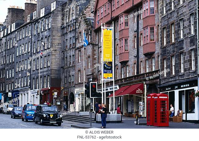 Cars in shopping street, Royal Mile, Lawnmarket, Edinburgh, Scotland