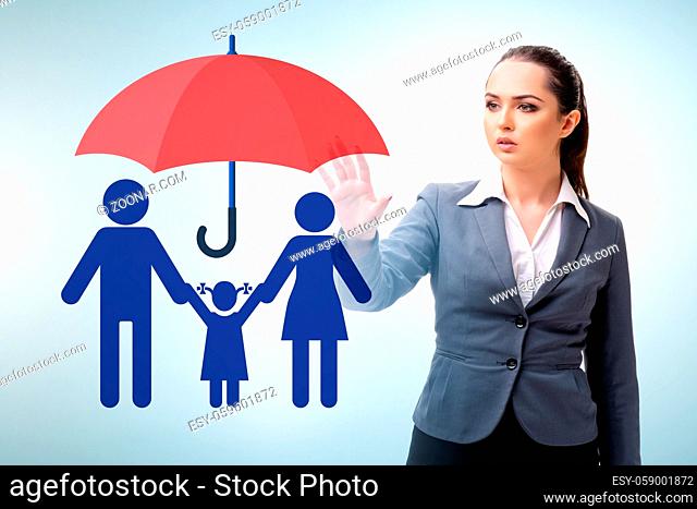 Life insurance concept with the businesswoman pressing button