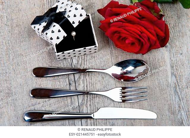 cutlery, rose and gift for Valentine's Day