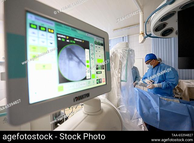 RUSSIA, IVANOVO - NOVEMBER 30, 2023: Yevgeny Varentsov, head of the urology department, performs a lithotripsy using thulium fibre laser at City Clinical...