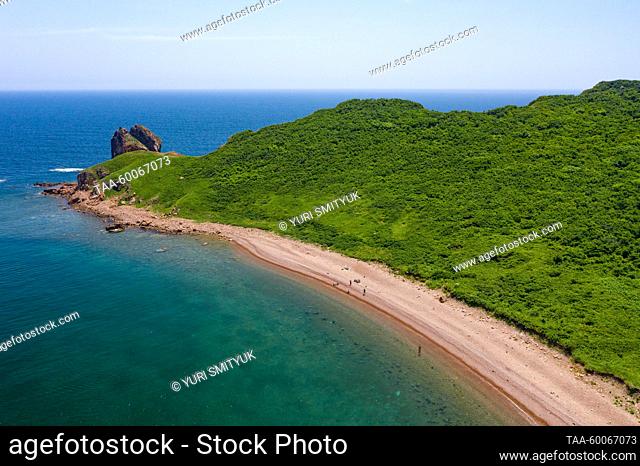 RUSSIA, VLADIVOSTOK - JUNE 24, 2023: The shoreline of Zheltukhin Island in Peter the Great Bay in the Sea of Japan. Yuri Smityuk/TASS