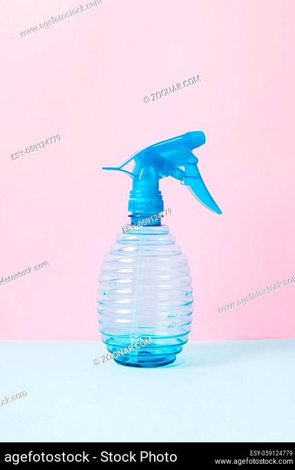 Home gardening spray bottle for plants. Spring cleaning concept. High quality photo