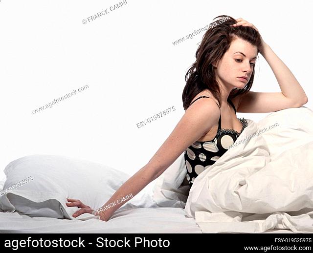 woman in bed awakening