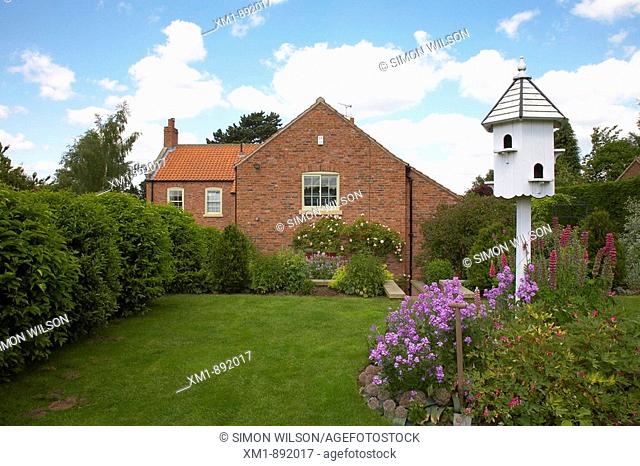 Dovecote in garden of English country house