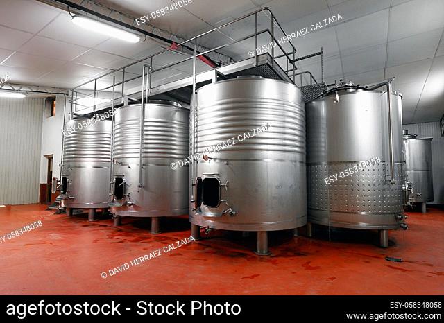 Industrial stainless steel vats in modern brewery. High quality photo