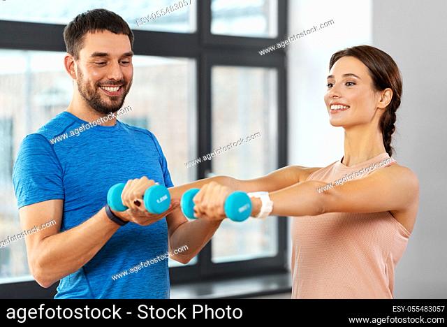 happy couple exercising at home