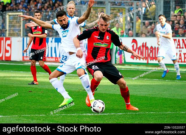v. li. im Zweikampf  Nadiem Amiri (Hoffenheim) vs Maximilian Philipp (Freiburg) beim Spiel der 1. BL: 16-17 - 24. Spieltag - SC Freiburg vs