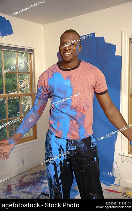 African American man covered in paint