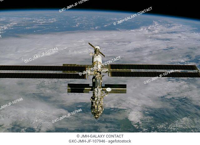 This is one of a series of digital still camera views showing the International Space Station (ISS) during a fly-around by the Space Shuttle Endeavour